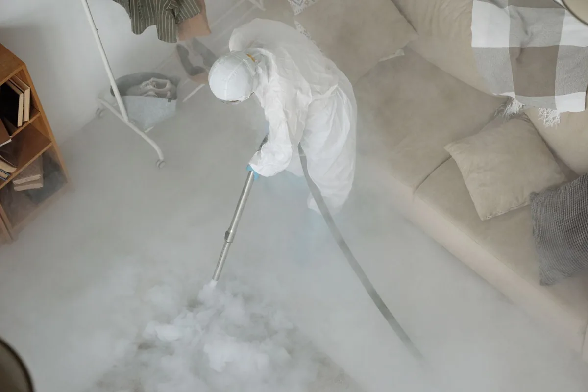 Biohazard cleanup technician in protective equipment, Montoursville, PA